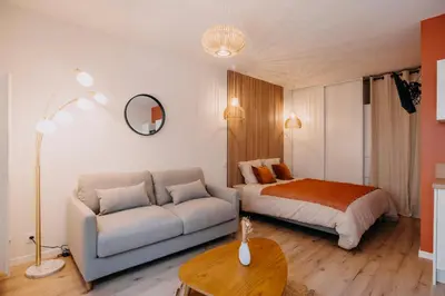Un ou plusieurs lits dans un hébergement de l'établissement L'ATELIER - Coeur de ville - Tout équipé