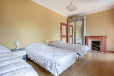 Un ou plusieurs lits dans un hébergement de l'établissement Maison de ville pour 7 dans la ville haute de Pornic