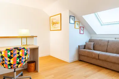 Coin salon dans l'établissement Au Fil de L'Erdre - Spacieux appt avec terrasse
