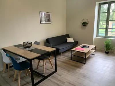 Coin salon dans l'établissement Appartement Hanami - Maulévrier Cholet Puy du Fou