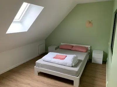 Un ou plusieurs lits dans un hébergement de l'établissement Appartement Hanami - Maulévrier Cholet Puy du Fou