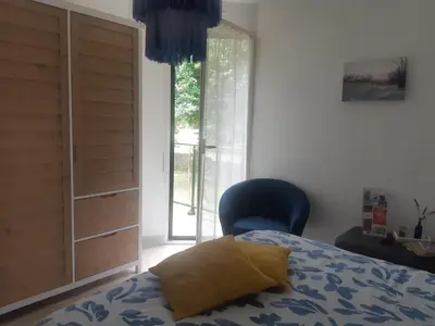 Un ou plusieurs lits dans un hébergement de l'établissement Chambre d'hôte cosy & zen