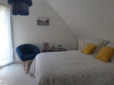 Un ou plusieurs lits dans un hébergement de l'établissement Chambre d'hôte cosy & zen
