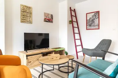 Télévision ou salle de divertissement dans l'établissement L'Ingénieux - Appt près de la Place Zola