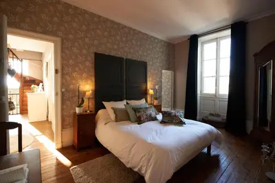 Un ou plusieurs lits dans un hébergement de l'établissement Il Était Une Fois Chez Moi