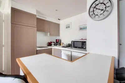 Cuisine ou kitchenette dans l'établissement Résidence Le Saint Denac - maeva Home - Appartement avec terrasse 2 pièces 4 personnes - Prestige - super Home MAE-4234