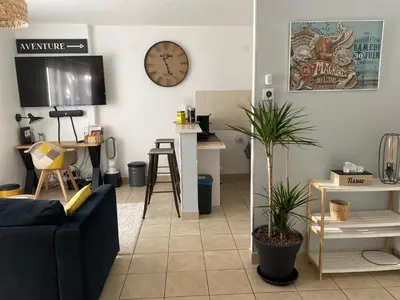 Coin salon dans l'établissement Appartement cosy jardin des plantes avec parking