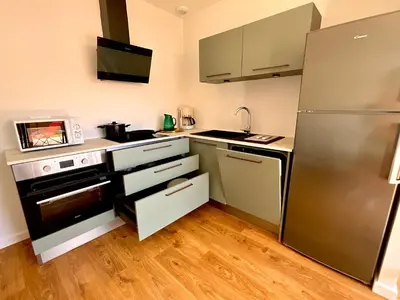 Cuisine ou kitchenette dans l'établissement Charmant studio Pornicais