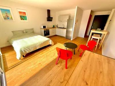 Un ou plusieurs lits dans un hébergement de l'établissement Charmant studio Pornicais