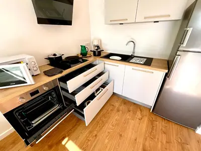 Cuisine ou kitchenette dans l'établissement Charmant studio Pornicais