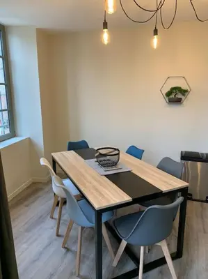 Coin salon dans l'établissement Appartement Torii - Maulévrier Cholet Puy du Fou