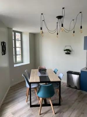Coin salon dans l'établissement Appartement Sakura - Maulévrier Cholet Puy du Fou