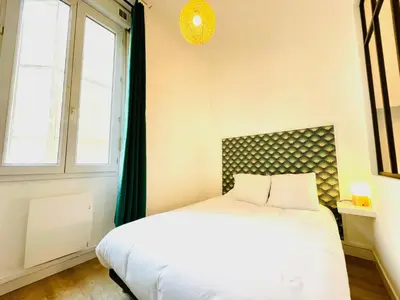 Un ou plusieurs lits dans un hébergement de l'établissement Lodge Cassard