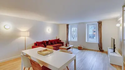 Coin salon dans l'établissement Le Rozé - Appart'Escale