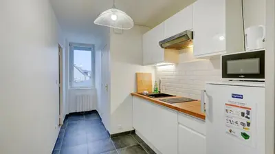 Cuisine ou kitchenette dans l'établissement Le Rozé - Appart'Escale