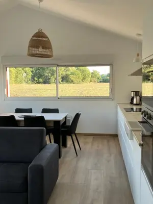 Cuisine ou kitchenette dans l'établissement L’Oasis