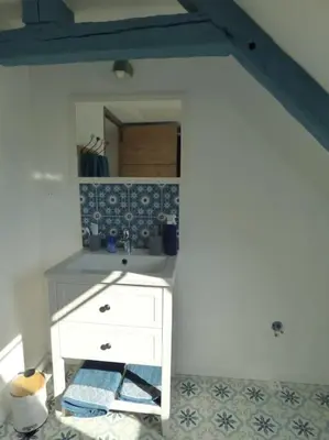 Cuisine ou kitchenette dans l'établissement Petite maison en Brière.
