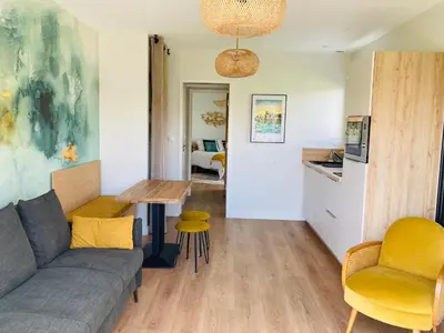 Cuisine ou kitchenette dans l'établissement Le Clos de Jade - Appt 3 étoiles avec piscine partagée