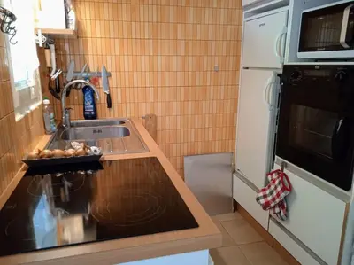 Cuisine ou kitchenette dans l'établissement Cottage spacieux Domaine de la Bretesche