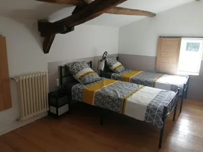 Un ou plusieurs lits dans un hébergement de l'établissement maison pleine de charme