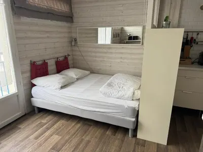 Un ou plusieurs lits dans un hébergement de l'établissement Studio hyper centre Pornichet