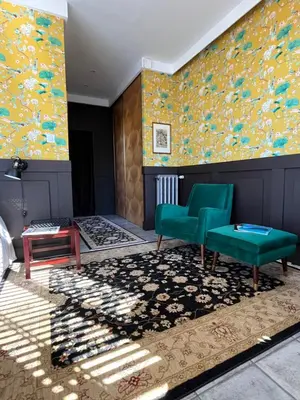 Coin salon dans l'établissement Un studio dans une villa balnéaire