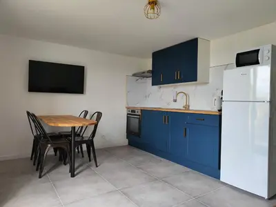 Cuisine ou kitchenette dans l'établissement Le FAYA