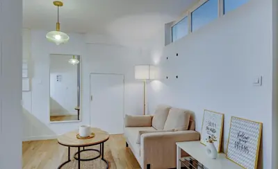 Coin salon dans l'établissement Le Marais - Appart'Escale