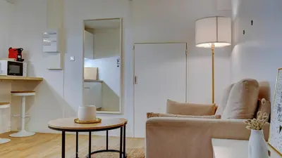 Coin salon dans l'établissement Le Marais - Appart'Escale