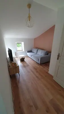 Coin salon dans l'établissement Appartement au calme
