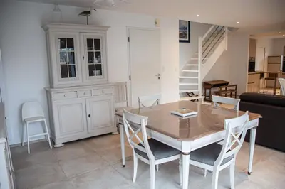 Coin salon dans l'établissement Maison de vacances bord de mer
