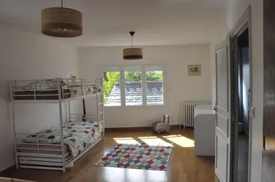 Un ou plusieurs lits dans un hébergement de l'établissement Ô Rivage, maison familiale bord de Loire