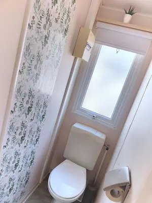 Salle de bains dans l'établissement Bungalow Cosy équipé