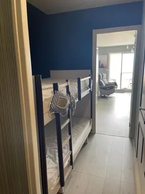 Un ou plusieurs lits dans un hébergement de l'établissement Appartement avec vue mer