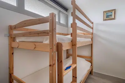 Un ou plusieurs lits dans un hébergement de l'établissement St Brévin - Studio - 4 Pers - Vue Mer
