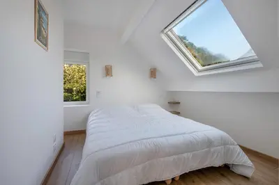 Un ou plusieurs lits dans un hébergement de l'établissement À 50m de la plage, jolie maison pour 8