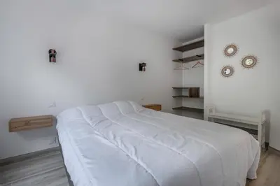 Un ou plusieurs lits dans un hébergement de l'établissement À 50m de la plage, jolie maison pour 8
