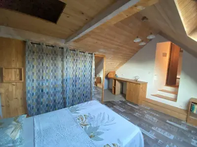 Un ou plusieurs lits dans un hébergement de l'établissement La maison paisible
