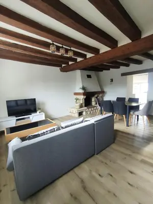 Télévision ou salle de divertissement dans l'établissement Maison de campagne