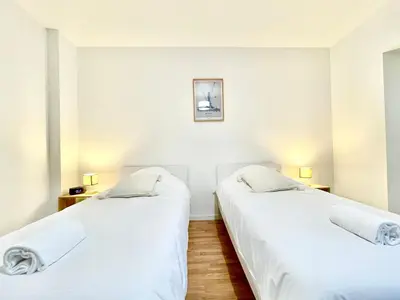 Un ou plusieurs lits dans un hébergement de l'établissement Appartsaintnazaire - Saint Nazaire - 5 Appartements - Centre Ville