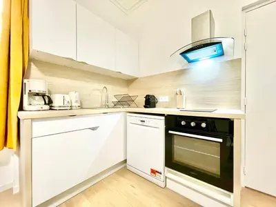 Cuisine ou kitchenette dans l'établissement Appartsaintnazaire - Saint Nazaire - 5 Appartements - Centre Ville