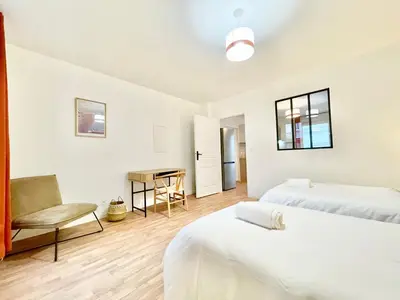 Un ou plusieurs lits dans un hébergement de l'établissement Appartsaintnazaire - Saint Nazaire - 5 Appartements - Centre Ville