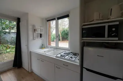 Cuisine ou kitchenette dans l'établissement Gites de La Gare - Le Studio