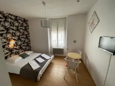 Un ou plusieurs lits dans un hébergement de l'établissement Hôtel de Nantes