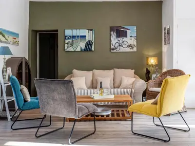 Coin salon dans l'établissement Holiday Home Le Bain du Papillon by Interhome