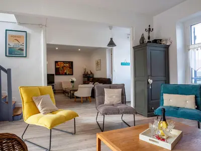 Coin salon dans l'établissement Holiday Home Le Bain du Papillon by Interhome