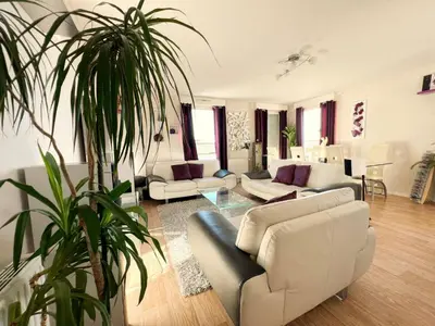 Coin salon dans l'établissement Le panoramique