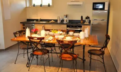 Cuisine ou kitchenette dans l'établissement Chambre d'Hôtes La Maisonnette