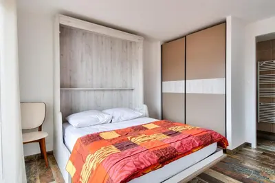 Un ou plusieurs lits dans un hébergement de l'établissement Maison pour 6 adultes et 3 enfants - Terrasse