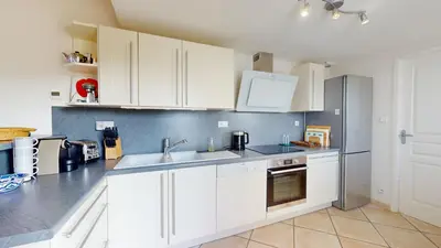 Cuisine ou kitchenette dans l'établissement Villa Terre et Mer avec piscine privee